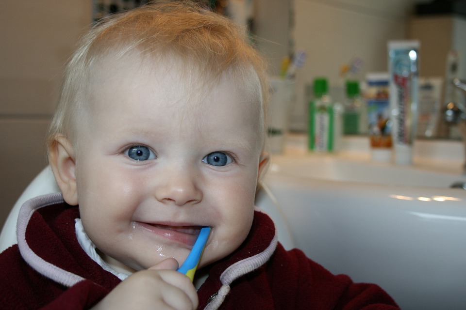 Child brushes his teeth