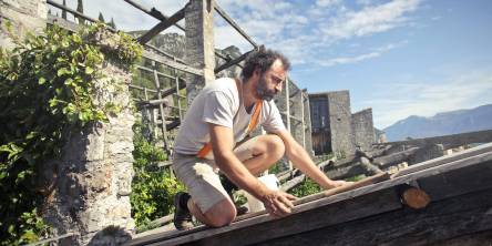  A Man is working on roof