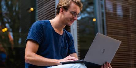  Photo of Man Using Laptop