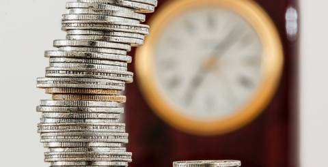 5 Industries You Should Invest in Now! Coins on top of each other