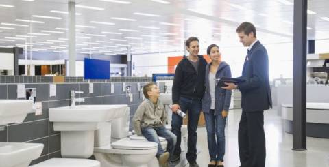 family shopping for a toilet