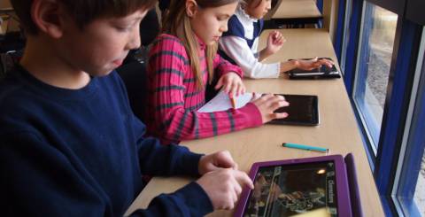 Children Using iPads at School