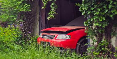 unwanted car parked scrap car