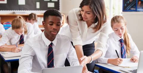 female teacher with student