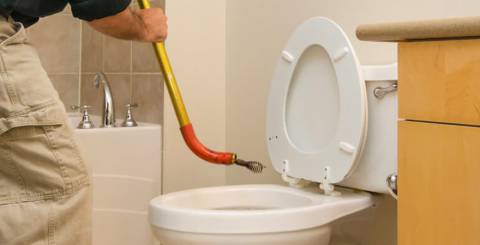 Unclogging toilet drain