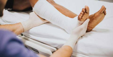 Individual with an injured leg Person being treated for an injured leg